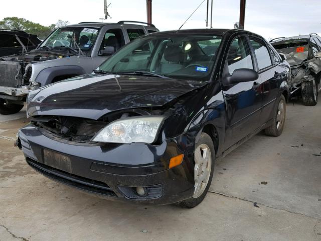 1FAHP34N97W357387 - 2007 FORD FOCUS ZX4 BLACK photo 2