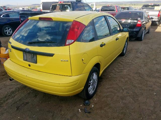 3FAFP37N45R120504 - 2005 FORD FOCUS ZX5 YELLOW photo 4