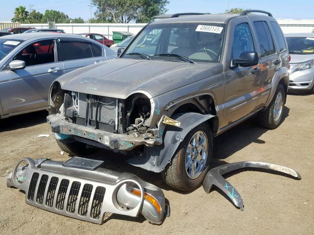 1J4GL58K74W297693 - 2004 JEEP LIBERTY LI GOLD photo 2