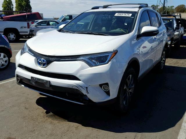 JTMRJREV6GD037098 - 2016 TOYOTA RAV4 HV XL WHITE photo 2