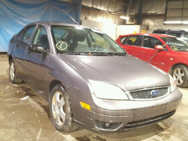 1FAHP34NX7W155688 - 2007 FORD FOCUS ZX4 GRAY photo 1