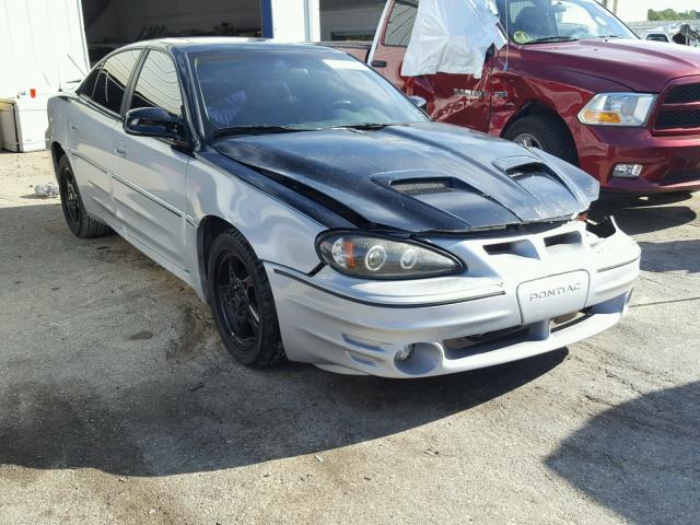 1G2NW52E42M574756 - 2002 PONTIAC GRAND AM G SILVER photo 1