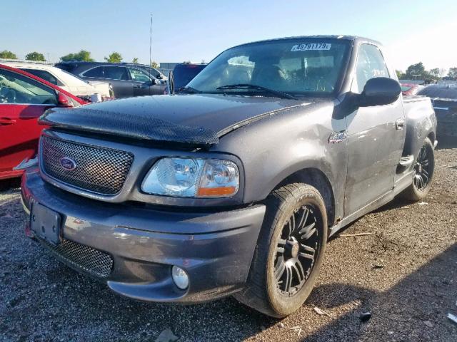 2FTRF07344CA38691 - 2004 FORD F150 SVT L GRAY photo 2