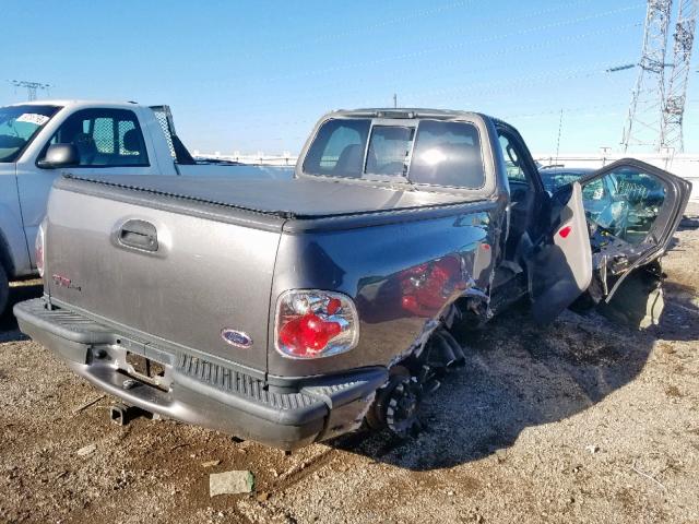 2FTRF07344CA38691 - 2004 FORD F150 SVT L GRAY photo 4