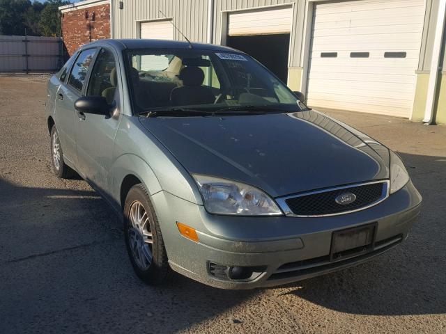 1FAFP34N75W195375 - 2005 FORD FOCUS ZX4 GREEN photo 1