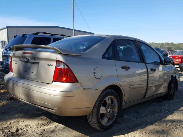 1FAHP34N06W190593 - 2006 FORD FOCUS ZX4 TAN photo 4