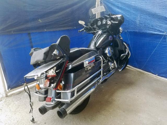 1HD1FC4117Y683361 - 2007 HARLEY-DAVIDSON FLHTCUI BLACK photo 4