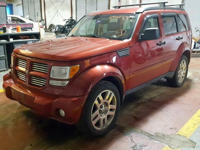 1D4PU4GX1BW501592 - 2011 DODGE NITRO HEAT MAROON photo 2