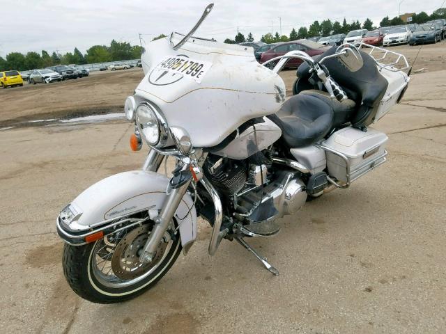 1HD1FC4137Y710592 - 2007 HARLEY-DAVIDSON FLHTCUI SILVER photo 2
