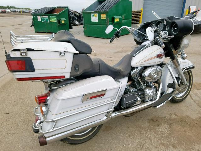 1HD1FC4137Y710592 - 2007 HARLEY-DAVIDSON FLHTCUI SILVER photo 4