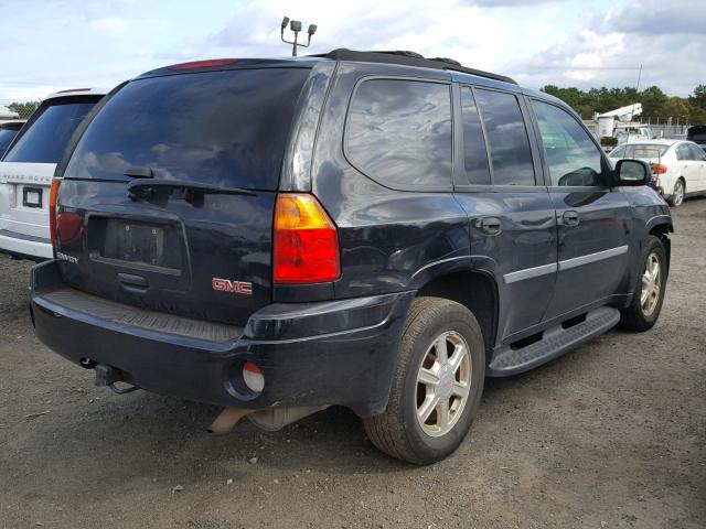 1GKDT33S392128729 - 2009 GMC ENVOY SLE BLACK photo 4