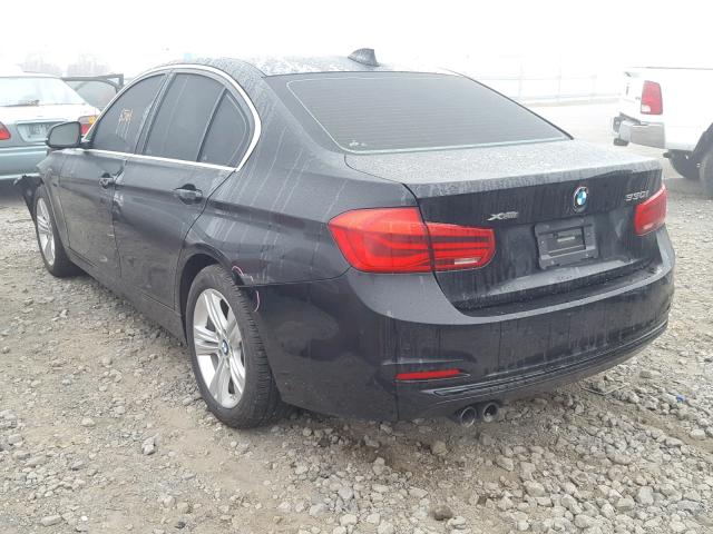 WBA8D9G36HNU64692 - 2017 BMW 330 XI BLACK photo 3