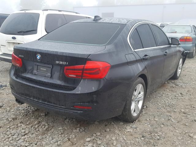 WBA8D9G36HNU64692 - 2017 BMW 330 XI BLACK photo 4