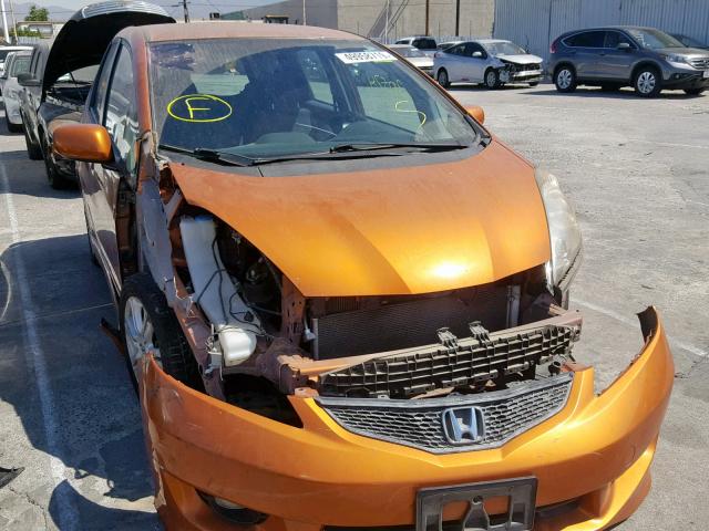 JHMGE8H55BC013048 - 2011 HONDA FIT SPORT ORANGE photo 1