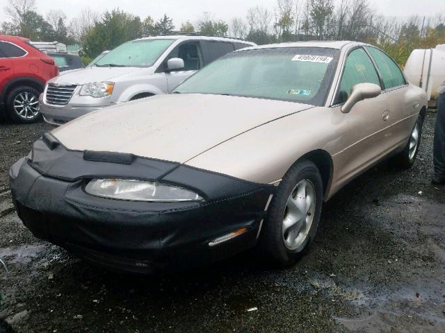 1G3GR62C5S4118801 - 1995 OLDSMOBILE AURORA BEIGE photo 2