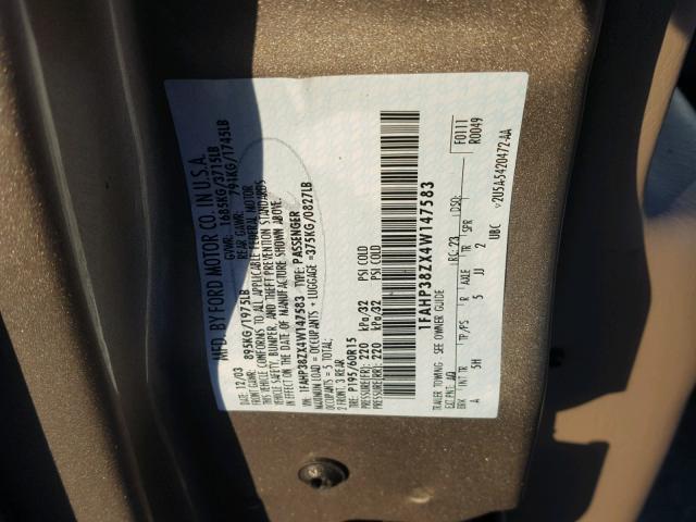 1FAHP38ZX4W147583 - 2004 FORD FOCUS ZTS GOLD photo 10
