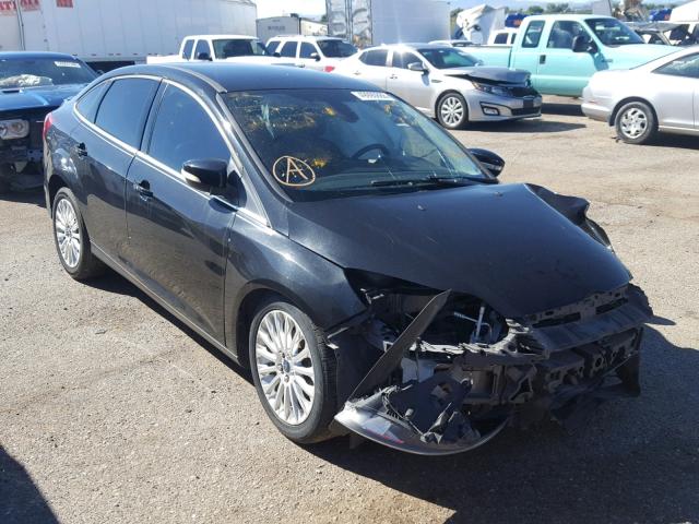 1FAHP3J28CL477672 - 2012 FORD FOCUS TITA BLACK photo 1