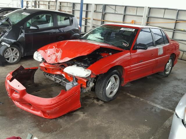 1G2NW52MXWC723383 - 1998 PONTIAC GRAND AM G RED photo 2