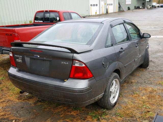 1FAFP34N25W252419 - 2005 FORD FOCUS ZX4 GRAY photo 4