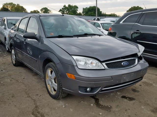 1FAHP34N47W227193 - 2007 FORD FOCUS ZX4 GRAY photo 1