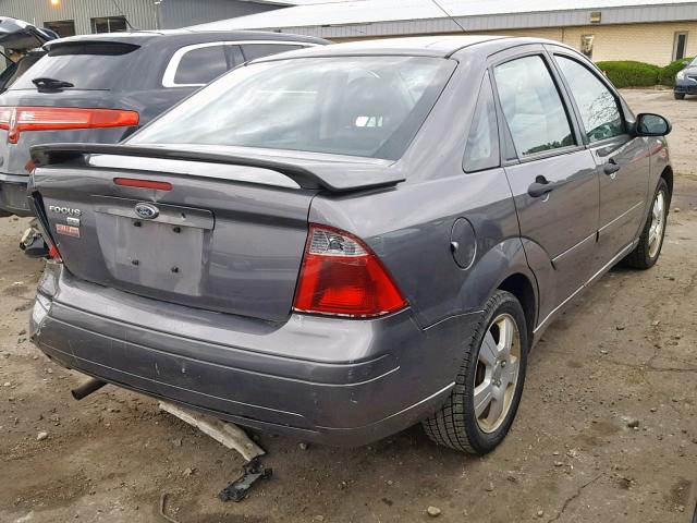 1FAHP34N47W227193 - 2007 FORD FOCUS ZX4 GRAY photo 4