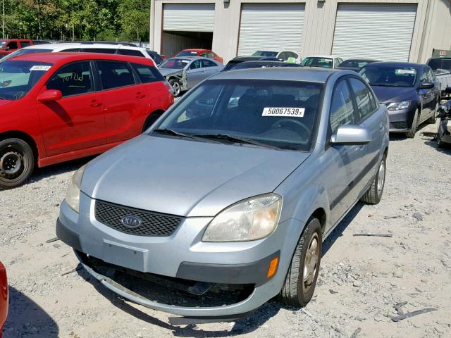 KNADE123166102300 - 2006 KIA RIO BLUE photo 2