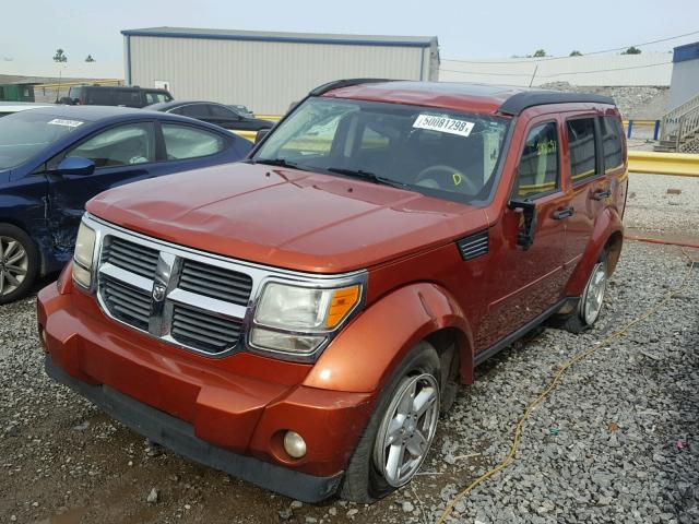 1D8GT28K47W724273 - 2007 DODGE NITRO SXT ORANGE photo 2