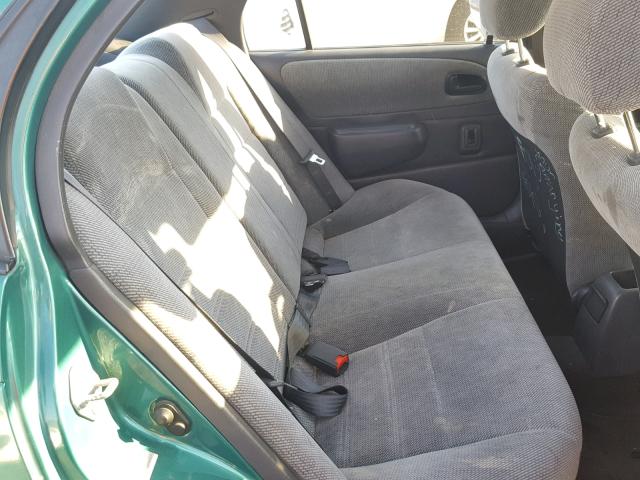 1NXBB02E3VZ506929 - 1997 TOYOTA COROLLA DX GREEN photo 6