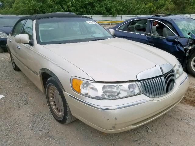 1LNHM83WXYY928316 - 2000 LINCOLN TOWN CAR C CREAM photo 1