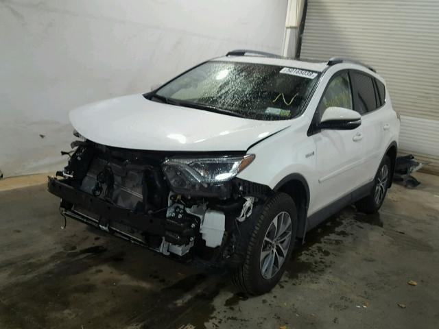 JTMRJREV0JD207012 - 2018 TOYOTA RAV4 HV LE WHITE photo 2