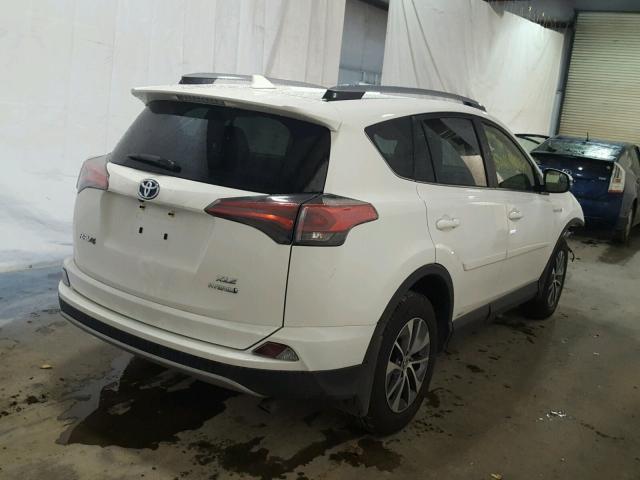 JTMRJREV0JD207012 - 2018 TOYOTA RAV4 HV LE WHITE photo 4