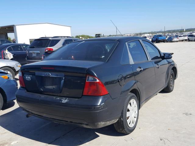 1FAFP34N07W183619 - 2007 FORD FOCUS ZX4 BLACK photo 4