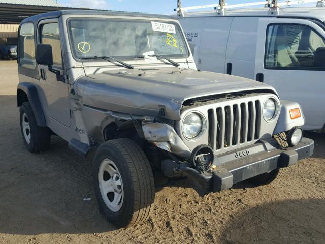 1J4FA49S9YP756345 - 2000 JEEP WRANGLER / SILVER photo 1