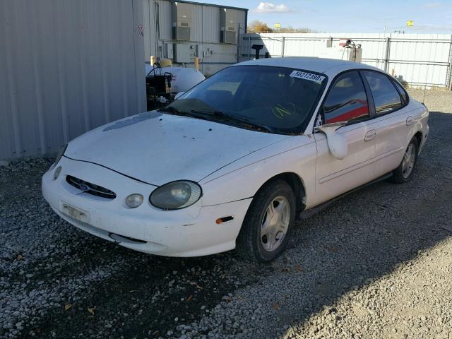 1FAFP53U4XG251659 - 1999 FORD TAURUS SE WHITE photo 2