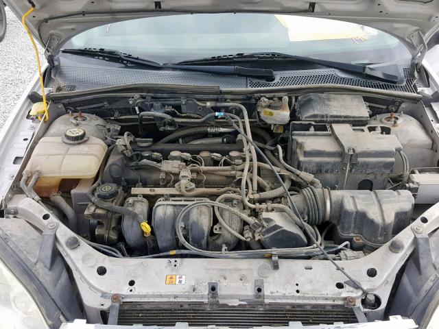 1FAFP34NX7W121936 - 2007 FORD FOCUS ZX4 SILVER photo 7