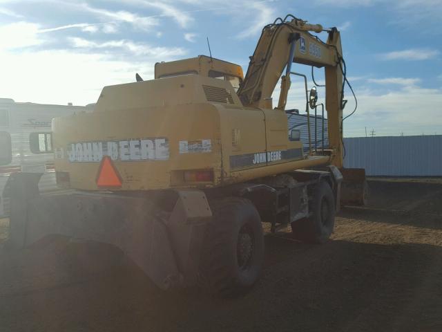 FF595DX001667 - 1998 JOHN DEERE 590 YELLOW photo 4