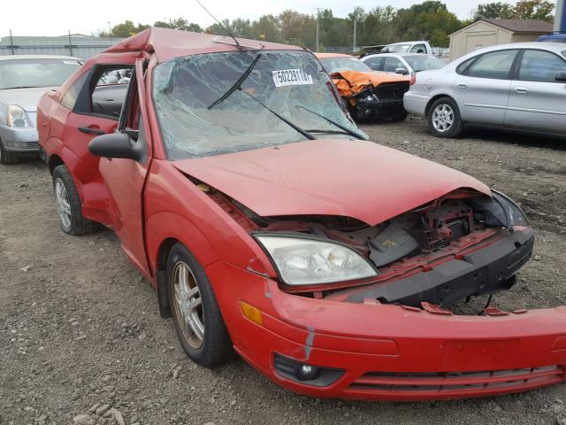 1FAFP34N35W283212 - 2005 FORD FOCUS ZX4 RED photo 1