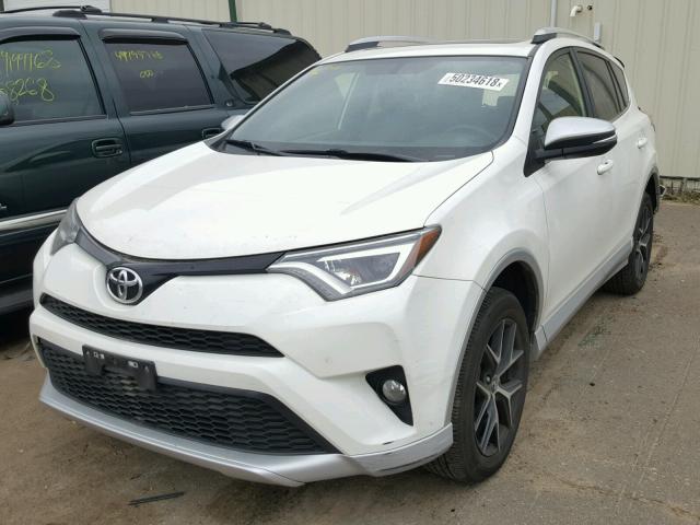 JTMJFREV8GJ057451 - 2016 TOYOTA RAV4 SE WHITE photo 2