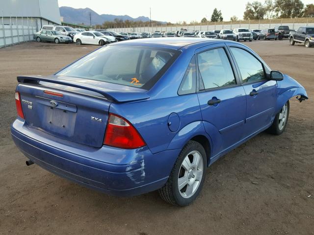 1FAFP34N85W232501 - 2005 FORD FOCUS ZX4 BLUE photo 4