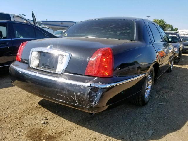 1LNHM85W41Y639595 - 2001 LINCOLN TOWN CAR C BLACK photo 4