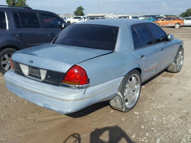 2FAFP73WX3X156525 - 2003 FORD CROWN VICT BLUE photo 4