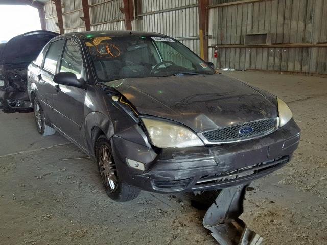 1FAFP34N57W321963 - 2007 FORD FOCUS ZX4 GRAY photo 1