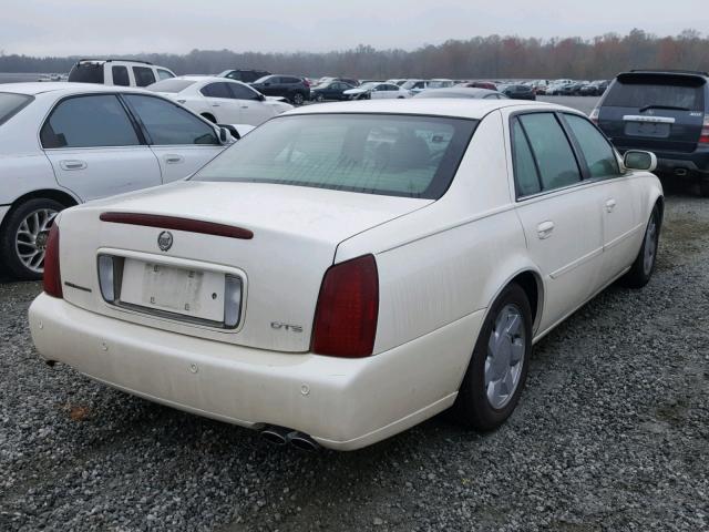 1G6KF5793YU331574 - 2000 CADILLAC DEVILLE DT WHITE photo 4