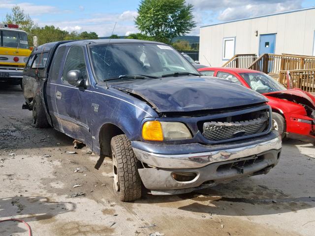 2FTRX18W94CA01163 - 2004 FORD F-150 HERI BLUE photo 1