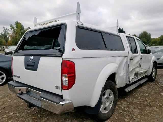 1N6AD09U17C426770 - 2007 NISSAN FRONTIER C WHITE photo 4