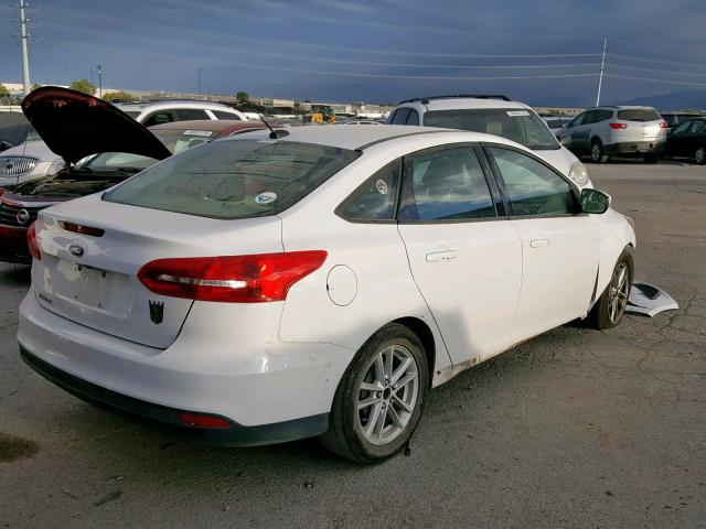 1FADP3F2XFL327476 - 2015 FORD FOCUS SE WHITE photo 4