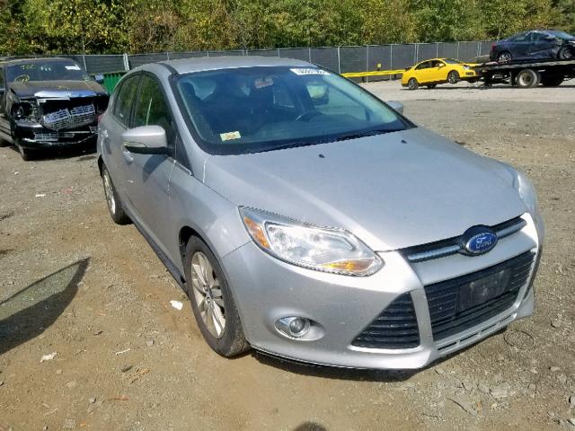 1FAHP3M27CL216657 - 2012 FORD FOCUS SEL SILVER photo 1