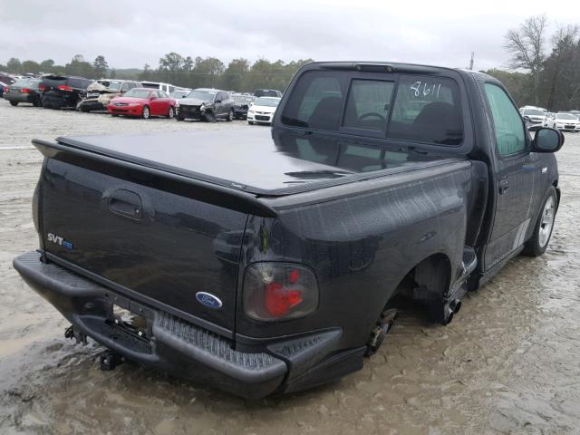 2FTZF07381CA38611 - 2001 FORD F150 SVT L BLACK photo 4