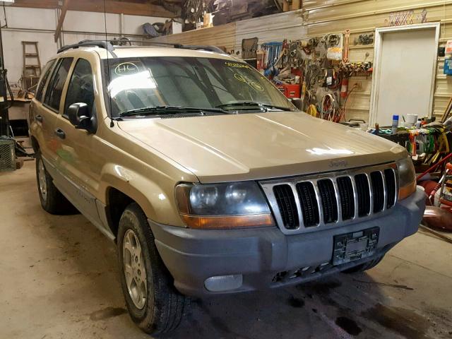 1J4GW48N0YC252534 - 2000 JEEP GRAND CHER TAN photo 1