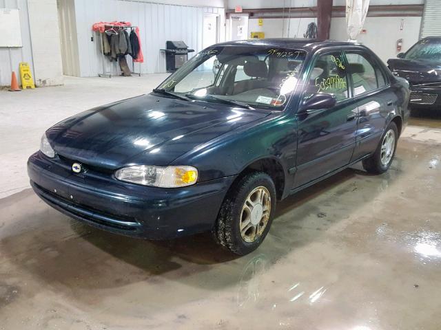 1Y1SK5285XZ435357 - 1999 CHEVROLET GEO PRIZM მწვანე ფოტო 2